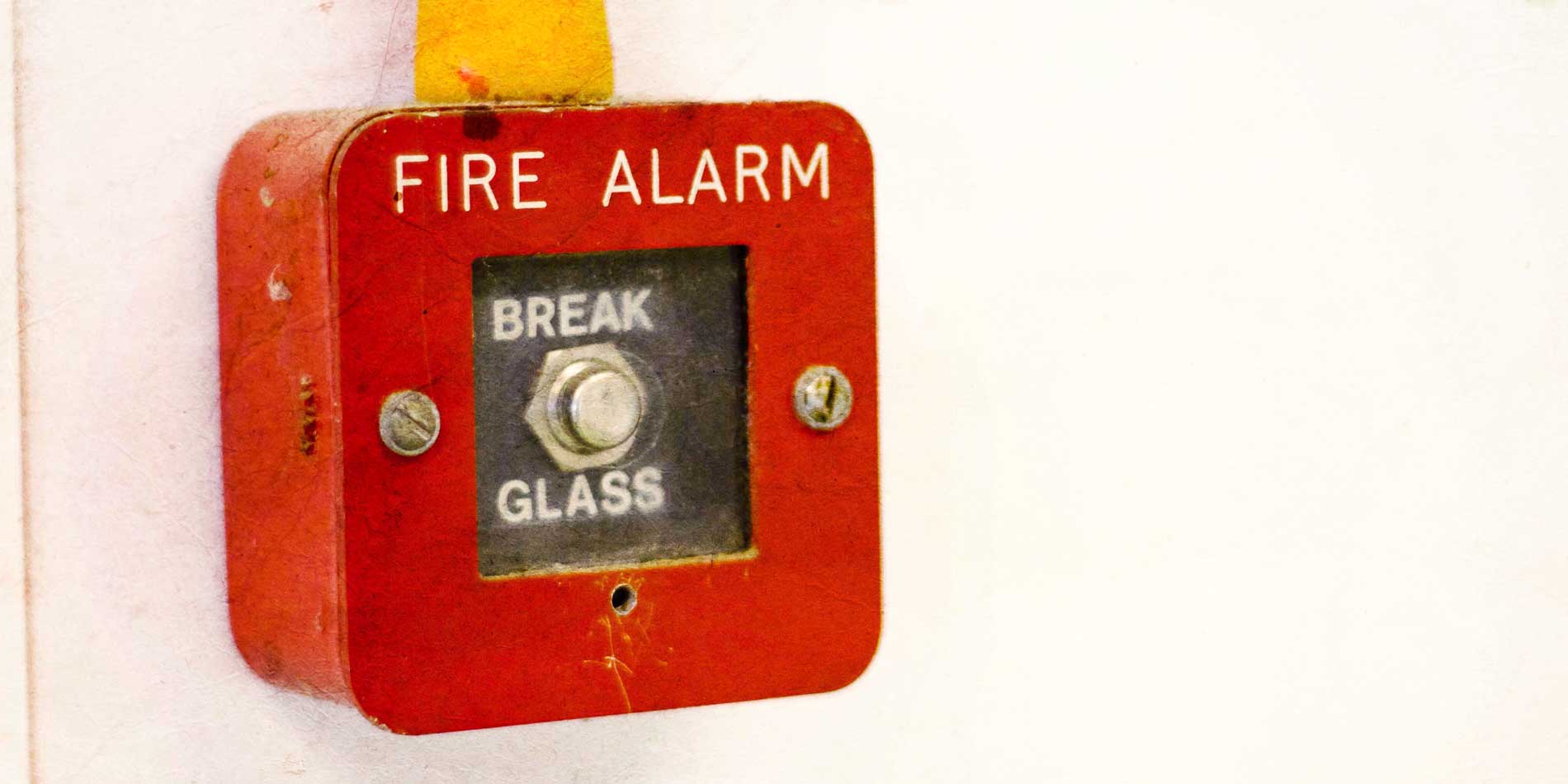 Creative image of old fire alarm break glass fire alarm point