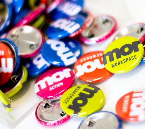 Pin badges with Mor Logo in a variety of colours